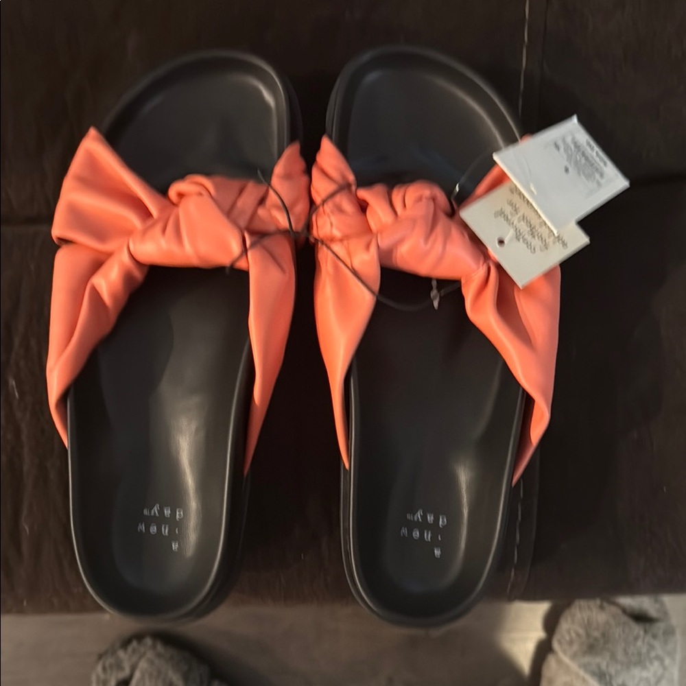 Beautiful coral and black sandals